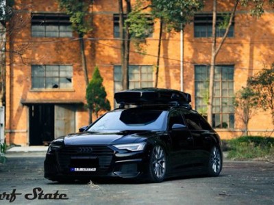 Cool black Audi A6 allroad bagged modern posture