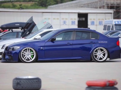 Blue old BMW 3 Series bagged colorful