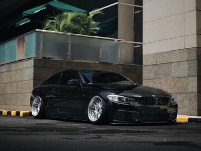 Elevating Dynamics: The Transformed BMW 4 Series as a Bagged Masterpiece