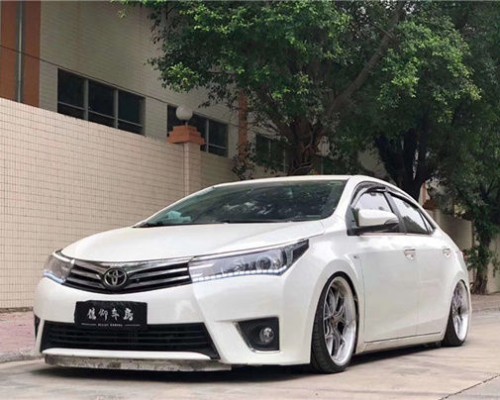 Trendy attitude Toyota Corolla Bagged performs low lying charm