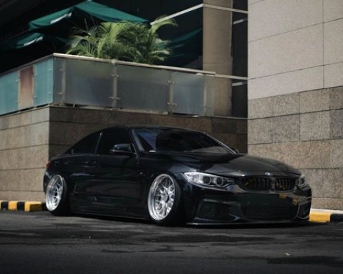 Elevating Dynamics: The Transformed BMW 4 Series as a Bagged Masterpiece